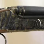 Fusil de chasse huglu juxtapose 200 ac contreplatine gravee cal 28/71cm